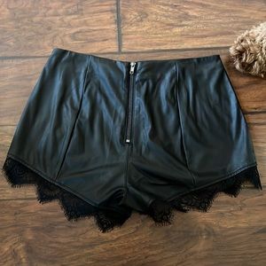 Leather shorts with lace trim